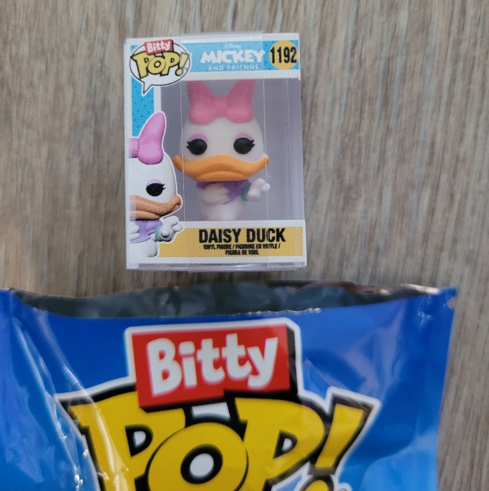 Funko Bitty Pop! of Daisy Duck from the Disney Mickey and Friends series. - Picture 1 of 8